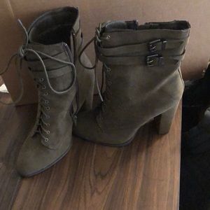 High heeled boots in olive